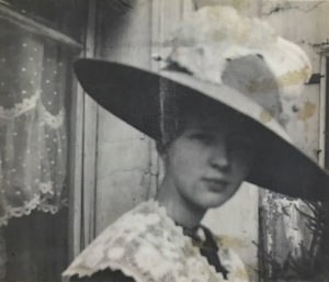 Doré: A woman who wore many “hats” literally and figuratively – her various roles were unusual of a woman in the 1910’s. Pictured here in Paris in 1912.